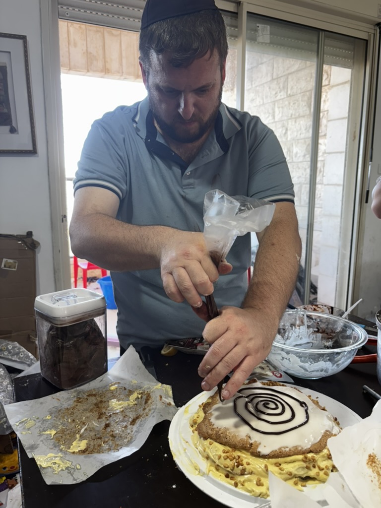 Piping the chocolate spiral by hand